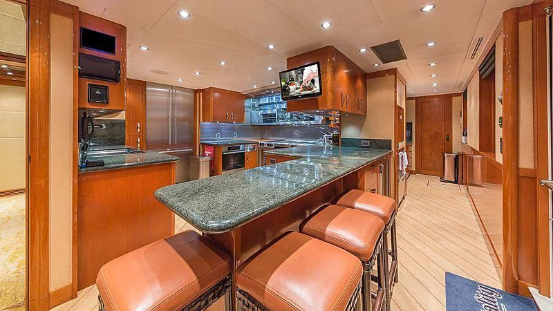 a kitchen with a bar and bar aboard AS YOU WISH Yacht for Sale