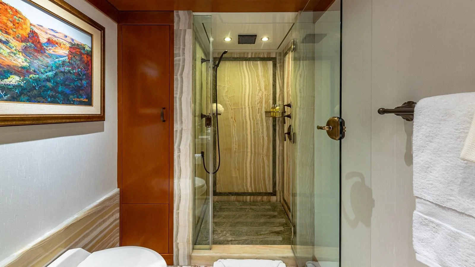 a bathroom with a glass shower aboard AS YOU WISH Yacht for Sale