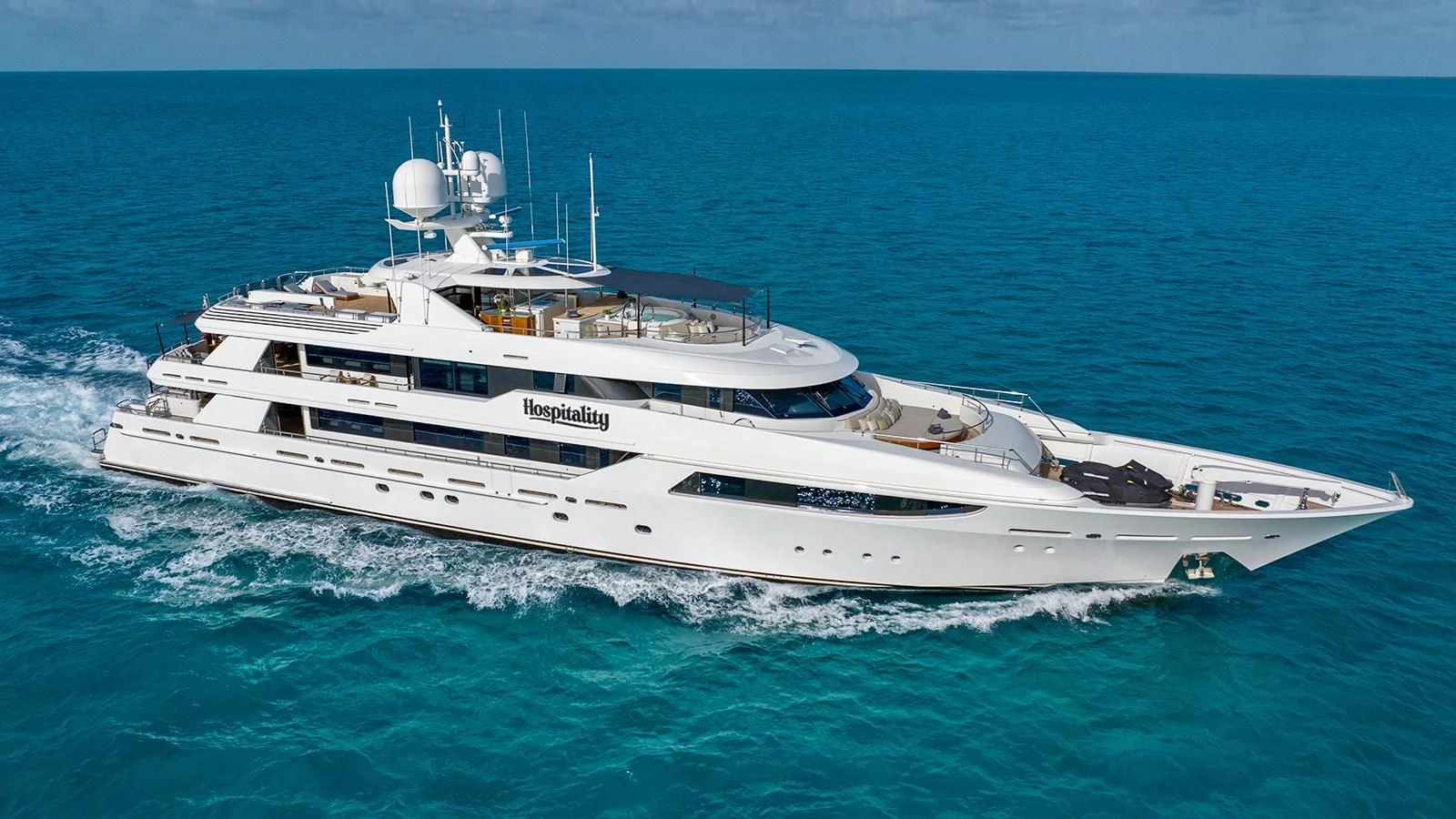 a white boat in the water aboard AS YOU WISH Yacht for Sale
