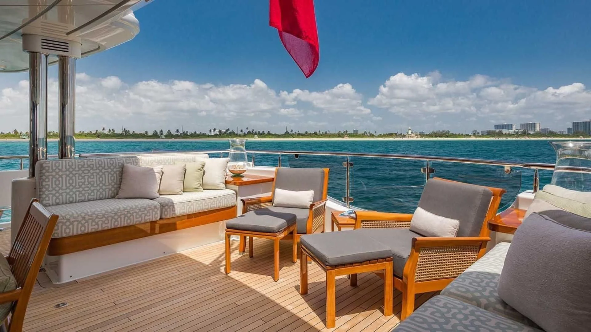a deck with chairs and tables on it aboard AS YOU WISH Yacht for Sale