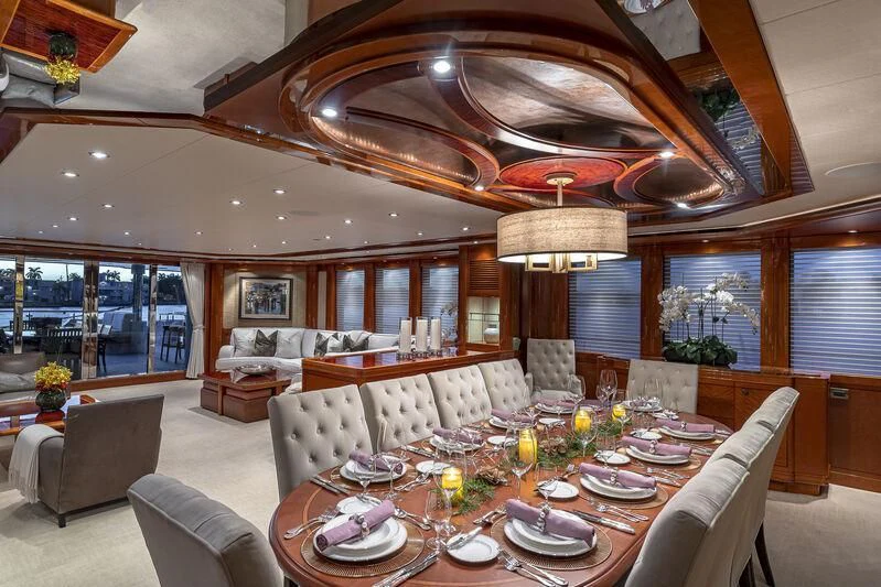 a large room with a table and chairs aboard AS YOU WISH Yacht for Sale