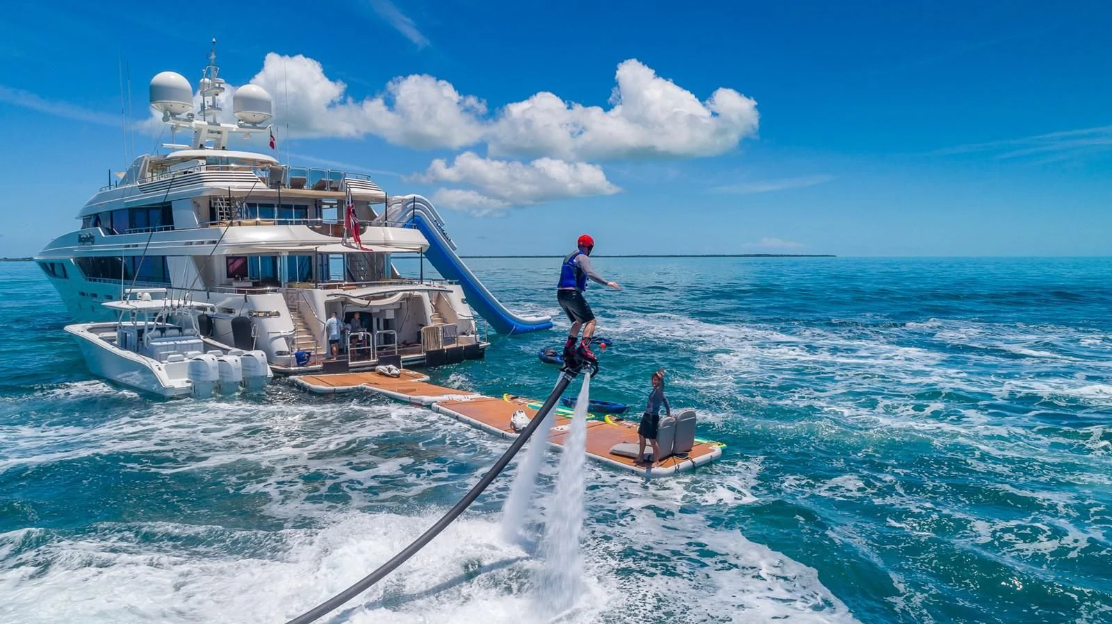 a boat with a rope attached to it and a boat in the water aboard AS YOU WISH Yacht for Sale