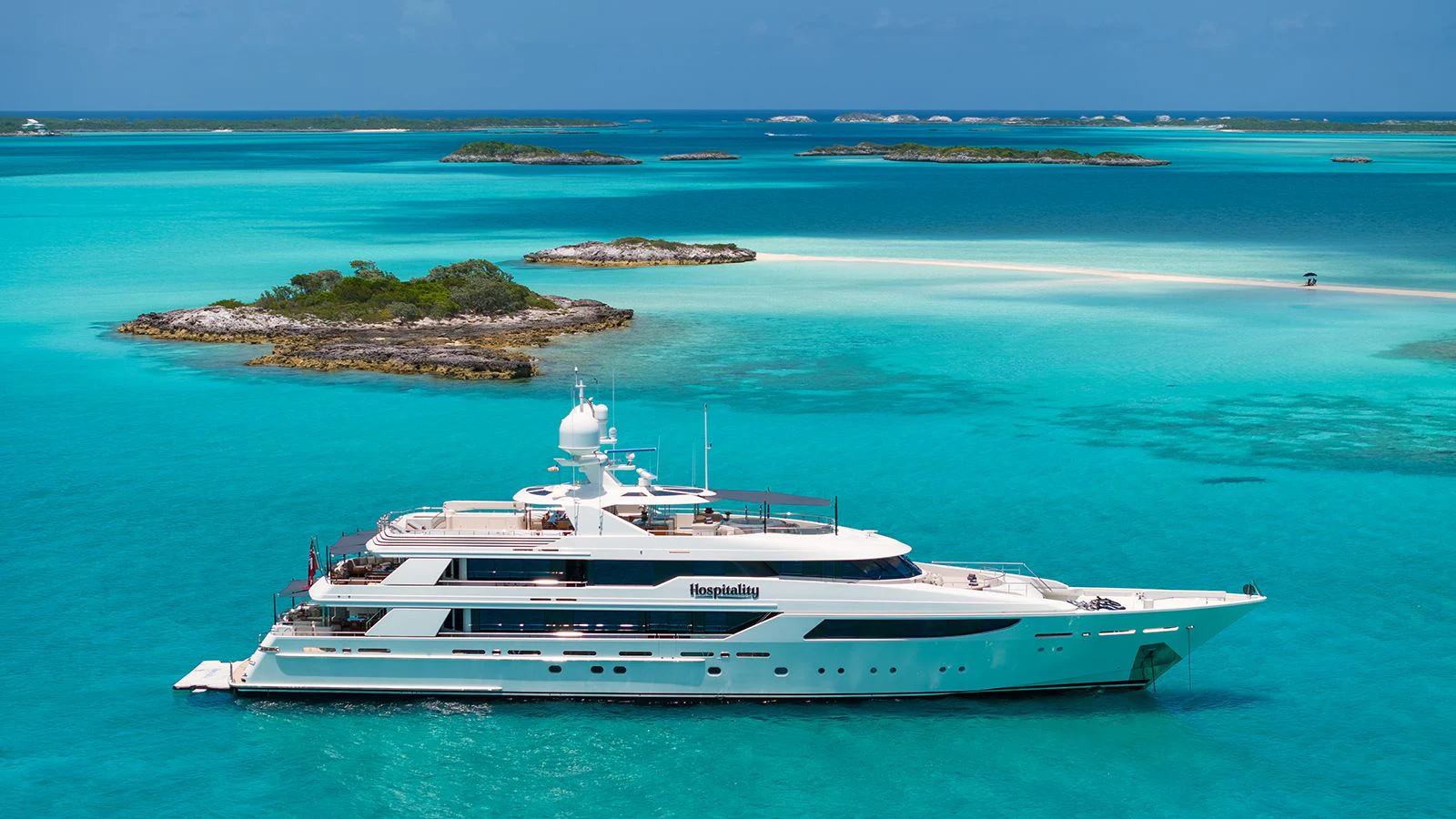 a white yacht in the ocean aboard AS YOU WISH Yacht for Sale