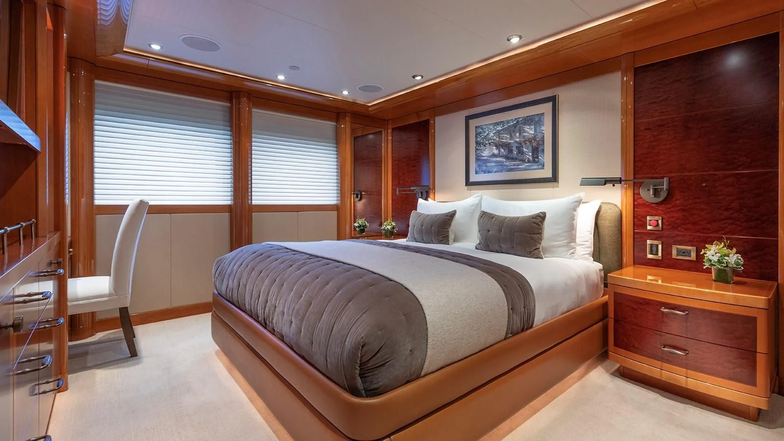 a bedroom with a bed and a desk aboard AS YOU WISH Yacht for Sale