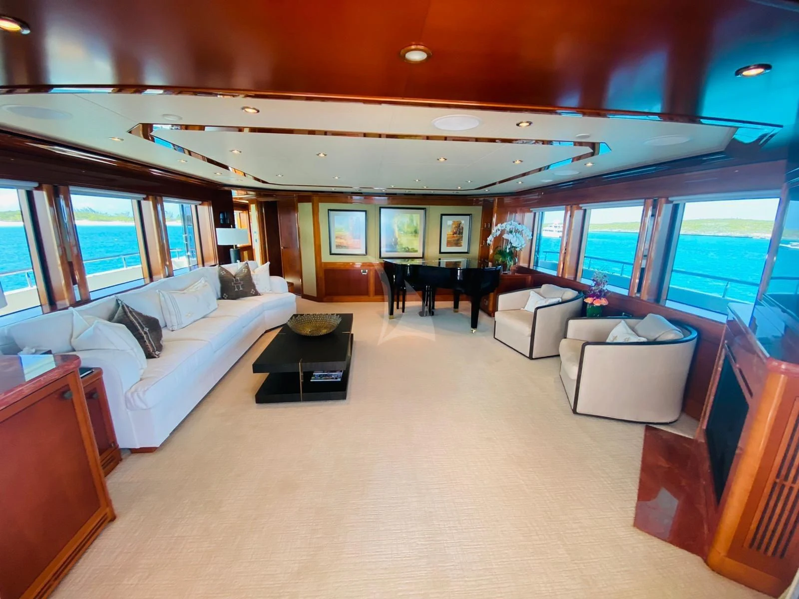 a large living room with a large window aboard AS YOU WISH Yacht for Sale