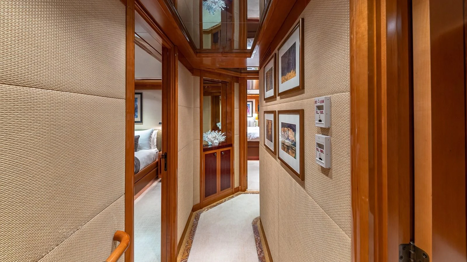 a hallway with a door and a window aboard AS YOU WISH Yacht for Sale