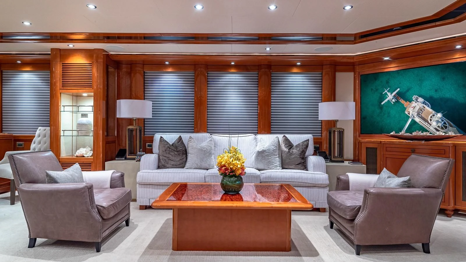 a living room with a couch and a coffee table aboard AS YOU WISH Yacht for Sale