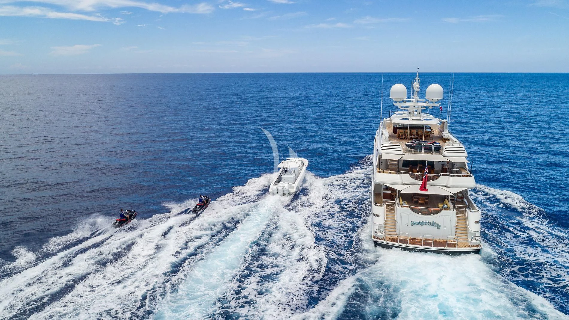 a couple of boats on the water aboard AS YOU WISH Yacht for Sale