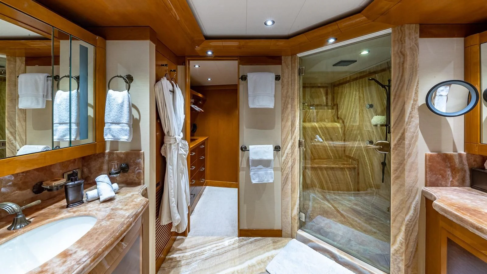 a bathroom with a shower and sink aboard AS YOU WISH Yacht for Sale