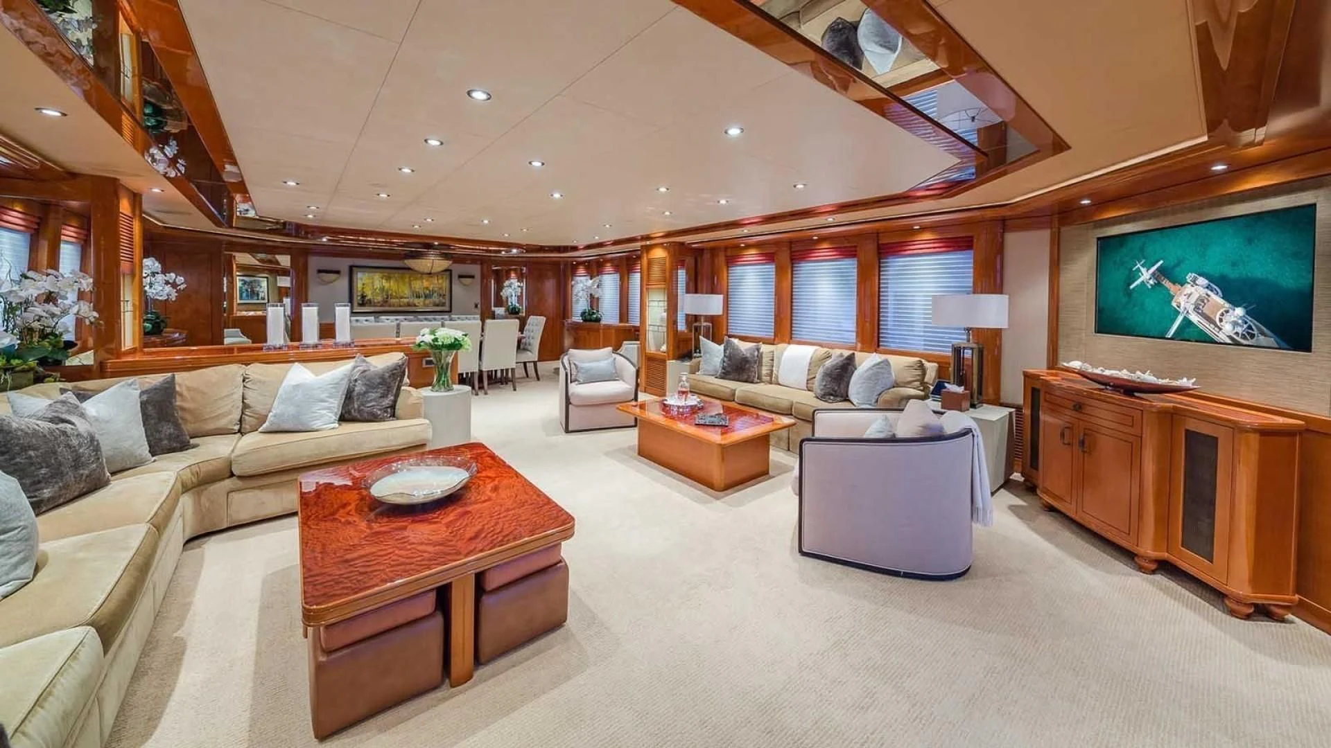 a living room with a large screen aboard AS YOU WISH Yacht for Sale