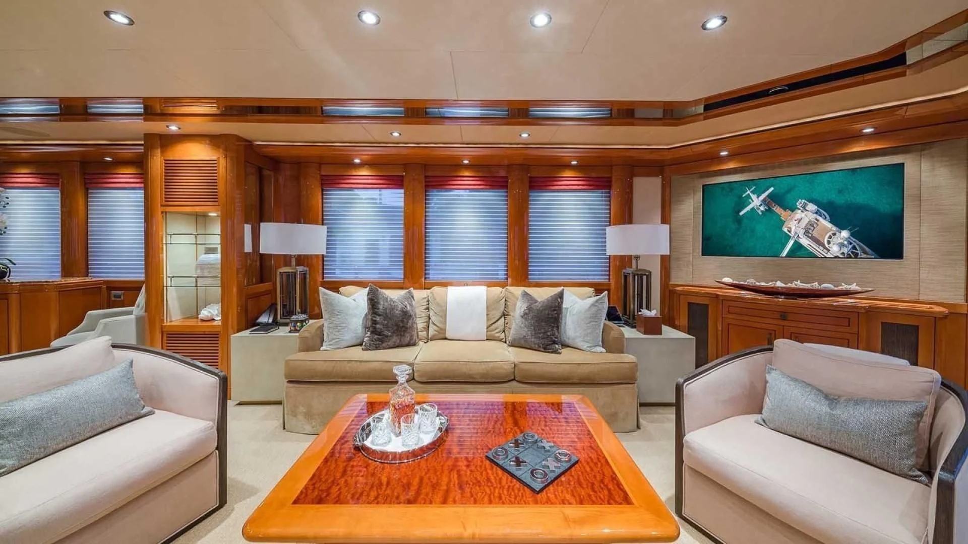 a living room with a large screen aboard AS YOU WISH Yacht for Sale