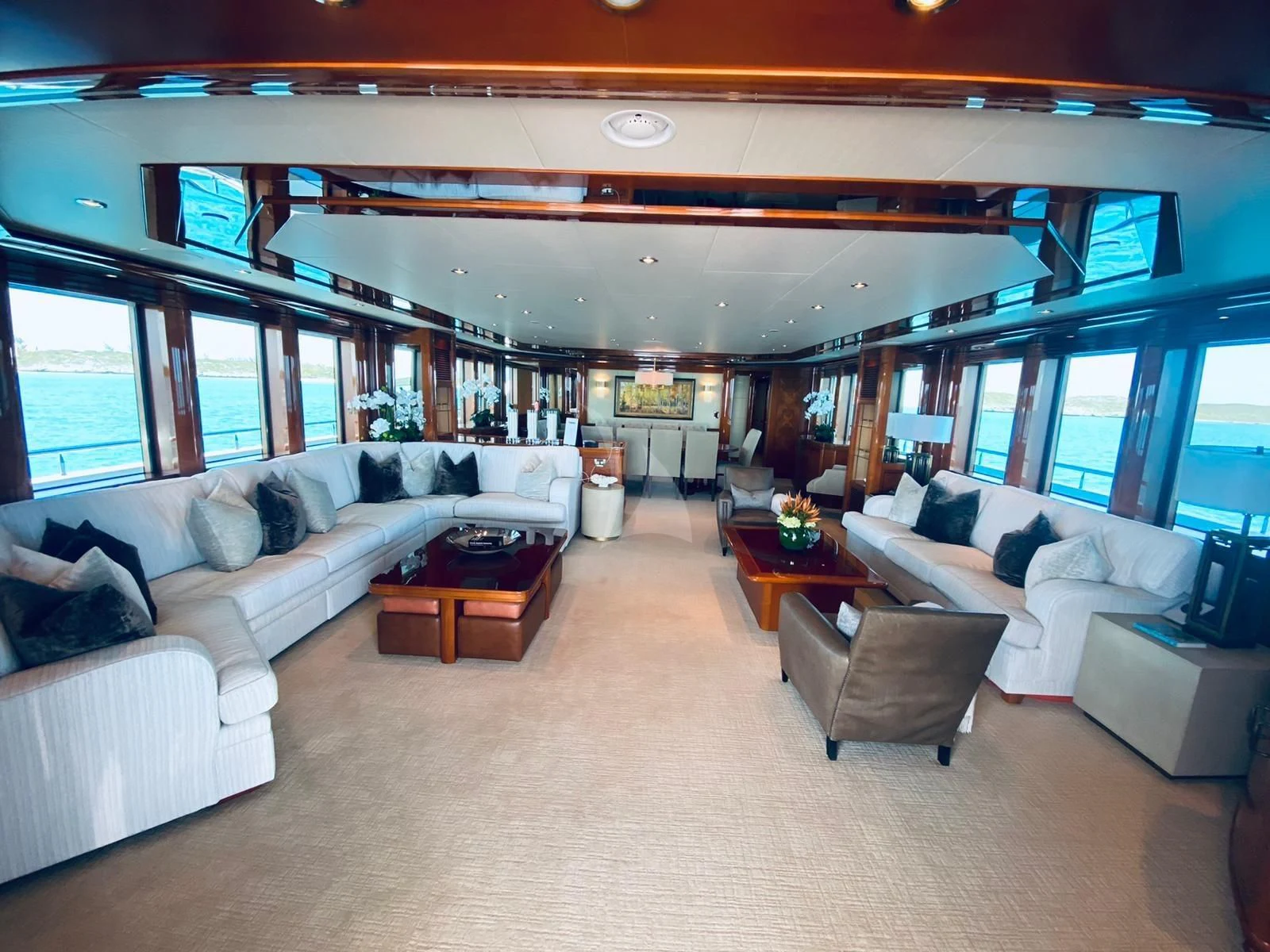 a living room with a couch and a table aboard AS YOU WISH Yacht for Sale