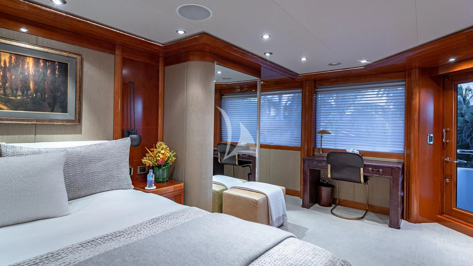 a room with a bed and a chair aboard AS YOU WISH Yacht for Sale