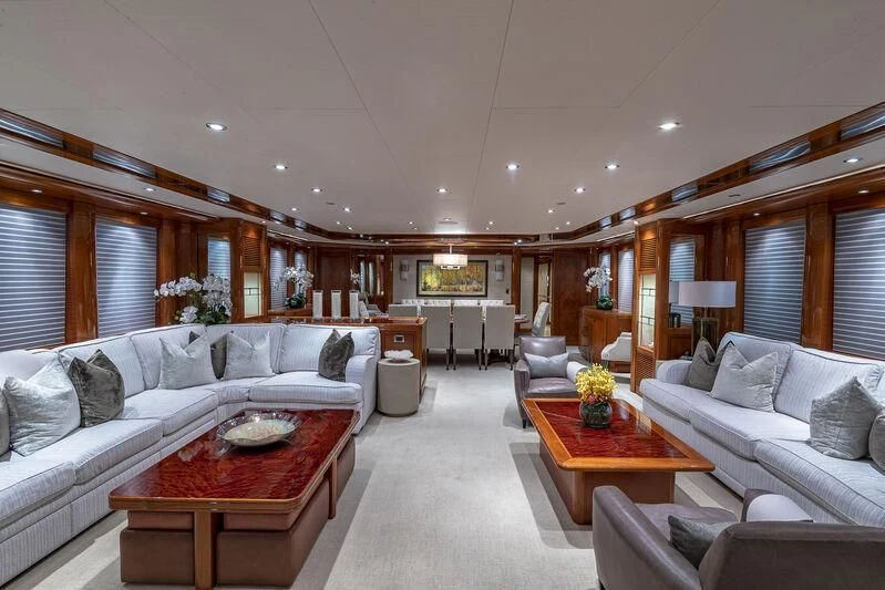 a living room with a couch and a coffee table aboard AS YOU WISH Yacht for Sale