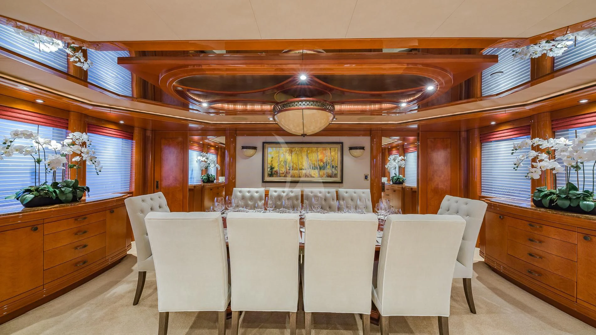 a room with a table chairs and a large window aboard AS YOU WISH Yacht for Sale