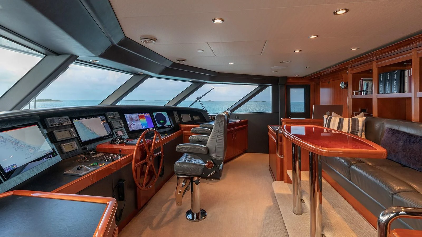 inside of a vehicle with desks and computers aboard AS YOU WISH Yacht for Sale