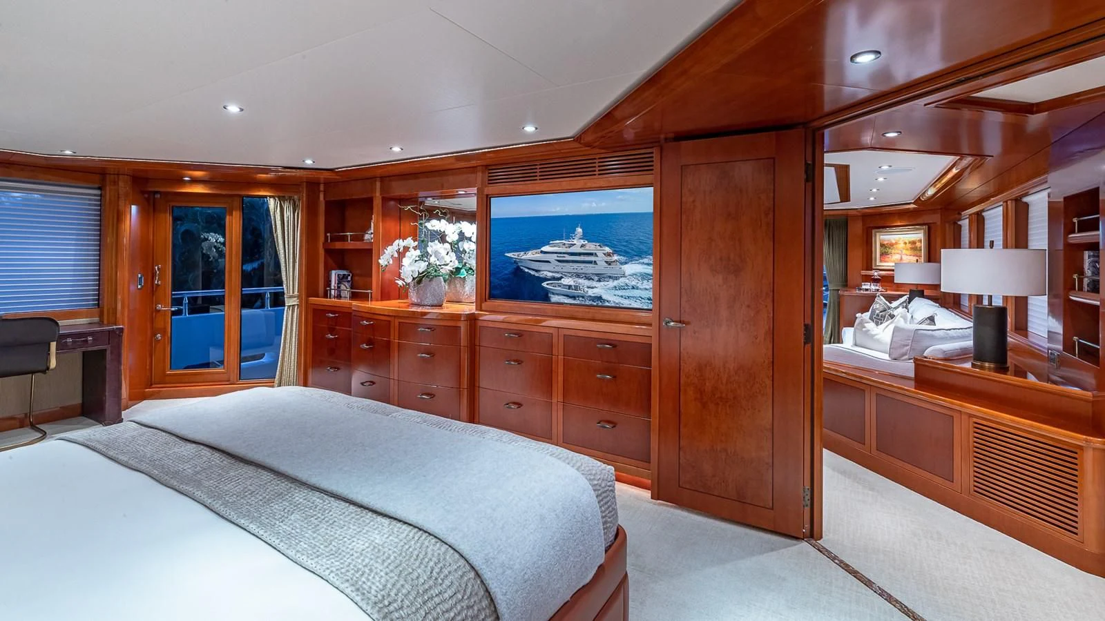 a room with a bed and a desk aboard AS YOU WISH Yacht for Sale