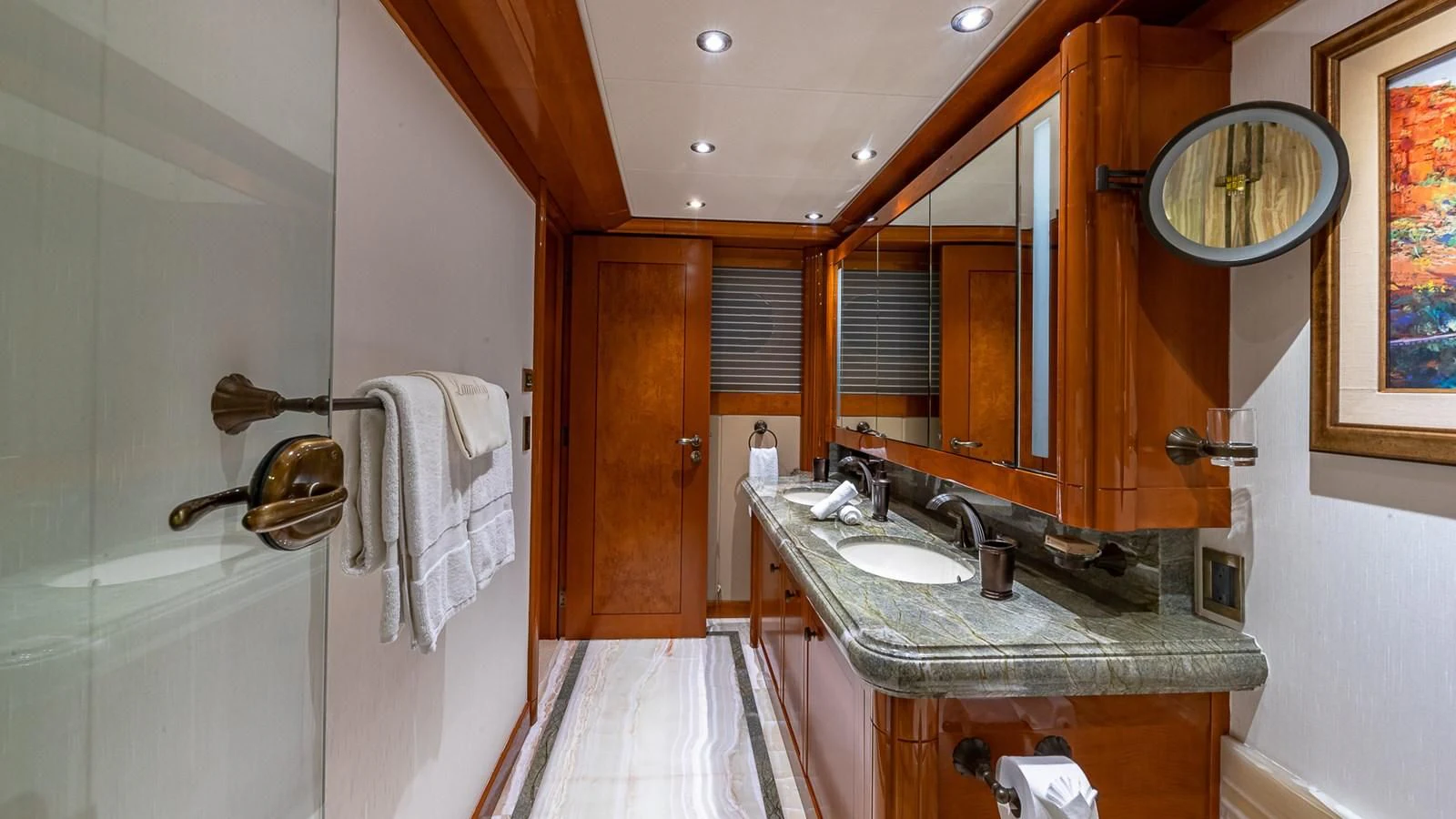 a bathroom with a sink and a mirror aboard AS YOU WISH Yacht for Sale