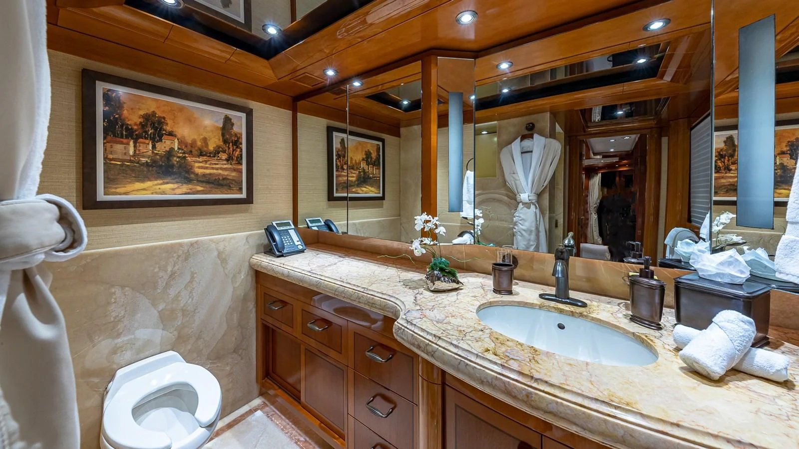 a bathroom with a large mirror aboard AS YOU WISH Yacht for Sale