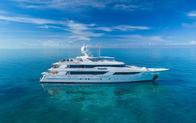 a white yacht in the ocean aboard AS YOU WISH Yacht for Sale