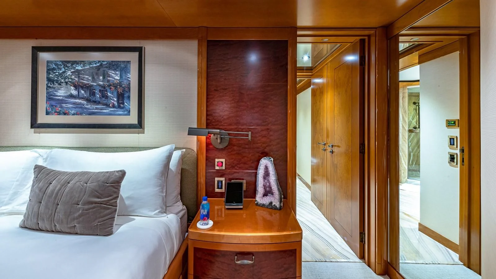a bedroom with a bed and a desk aboard AS YOU WISH Yacht for Sale