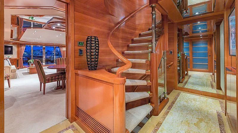 a wooden staircase in a house aboard AS YOU WISH Yacht for Sale