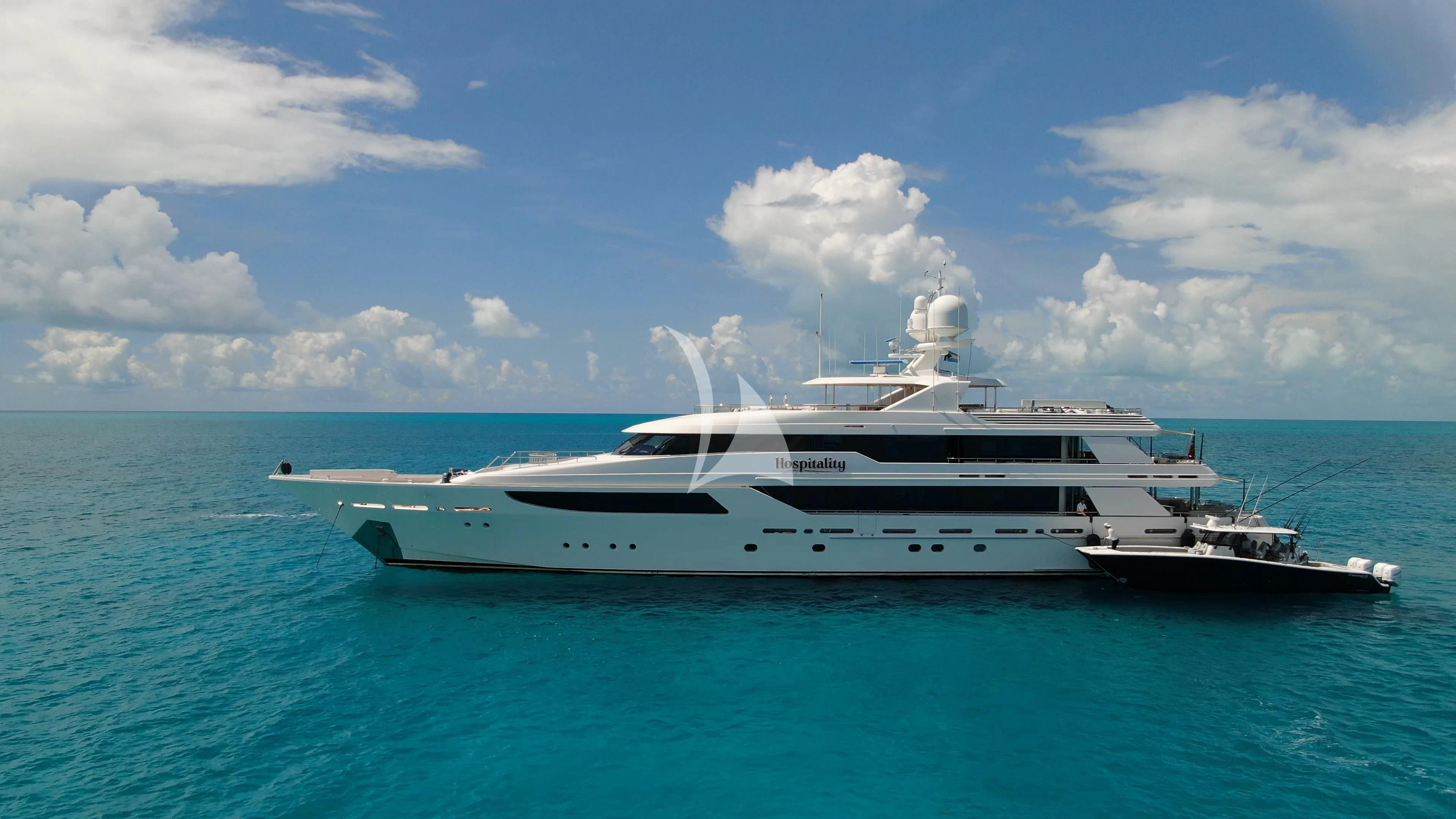 a white yacht in the water aboard AS YOU WISH Yacht for Sale