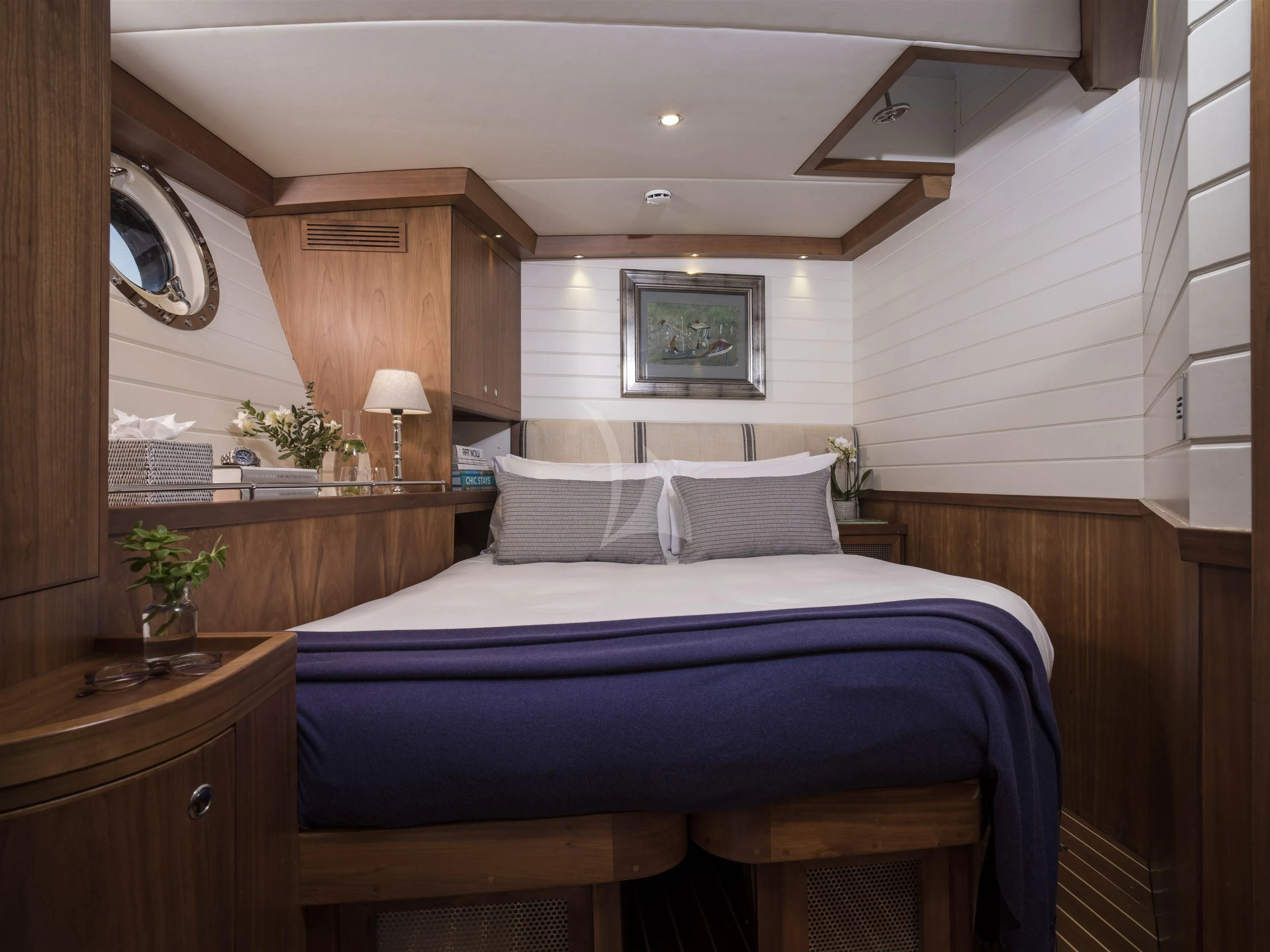 a bed in a room aboard ALEXA OF LONDON Yacht for Sale