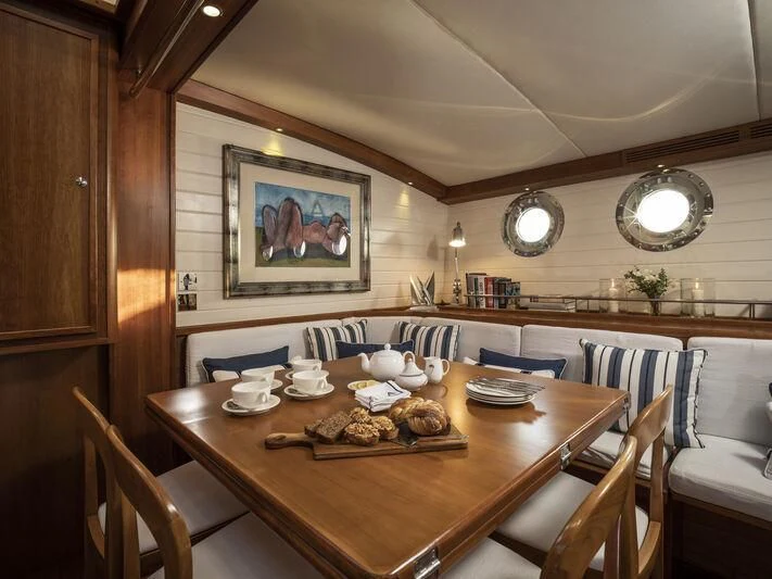 a dining table in a restaurant aboard ALEXA OF LONDON Yacht for Sale