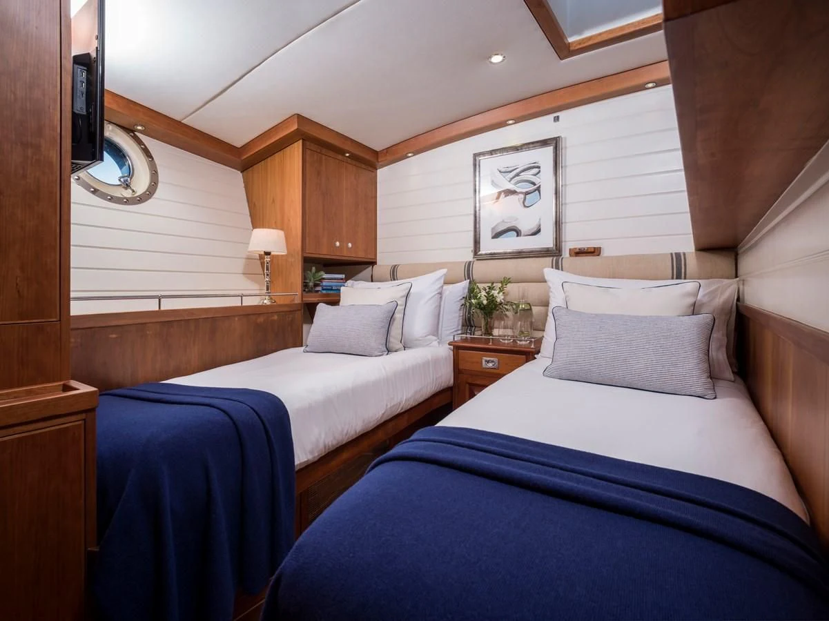 a couple of beds in a room aboard ALEXA OF LONDON Yacht for Sale