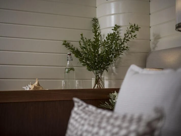 a small plant in a glass vase aboard ALEXA OF LONDON Yacht for Sale