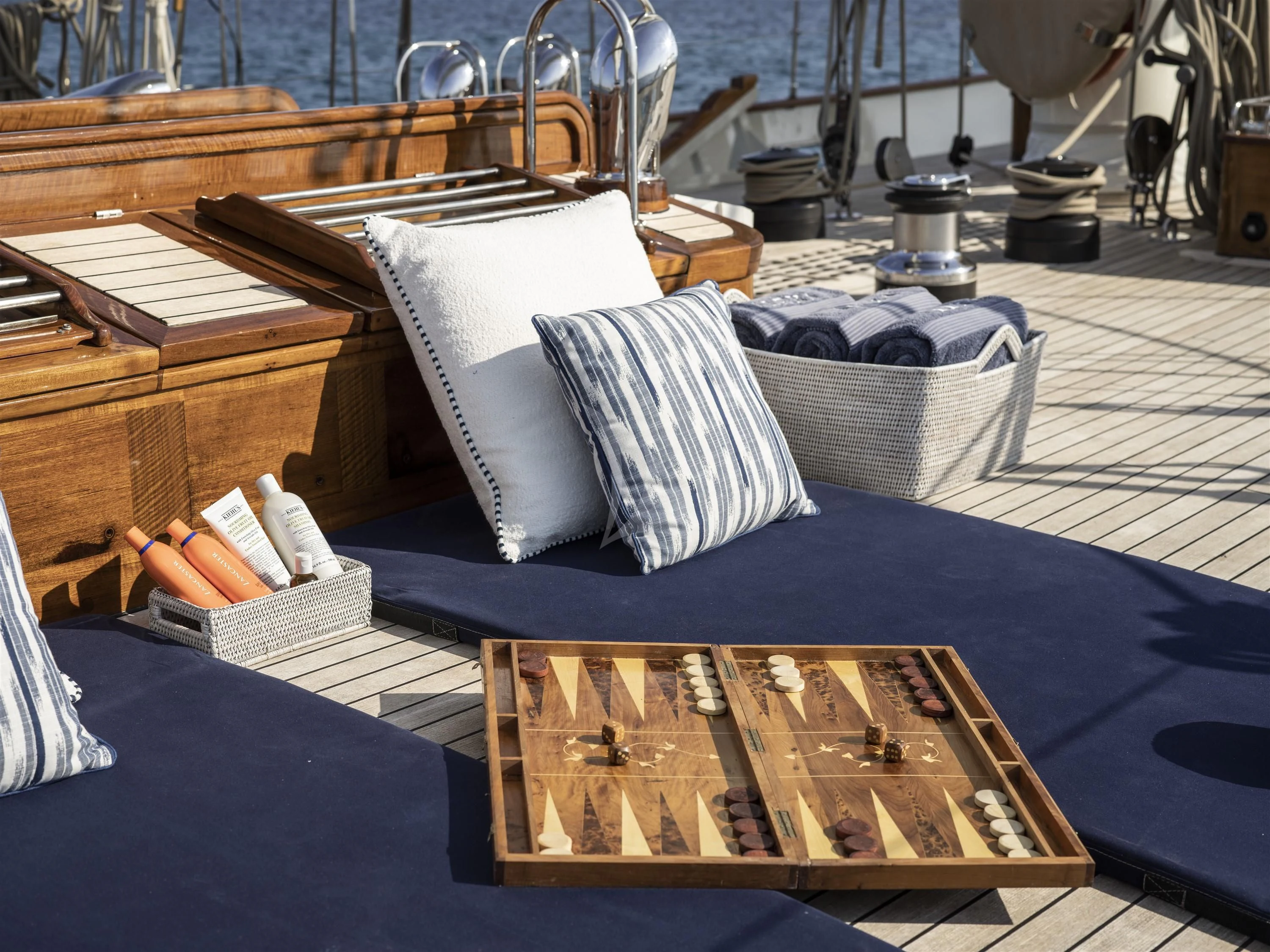a wooden boat with pillows aboard ALEXA OF LONDON Yacht for Sale