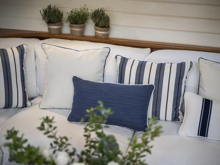 a group of pillows on a couch aboard ALEXA OF LONDON Yacht for Sale