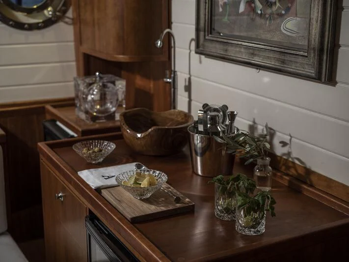 a kitchen counter with a bowl of food and a pot of vegetables aboard ALEXA OF LONDON Yacht for Sale