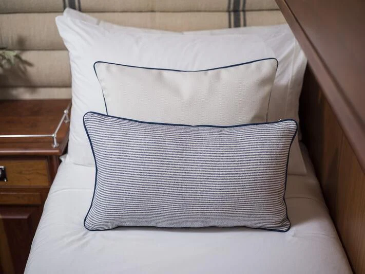 a pillow on a bed aboard ALEXA OF LONDON Yacht for Sale