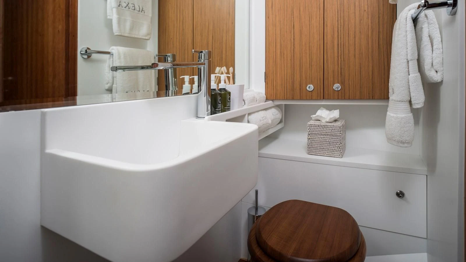 a bathroom with a sink and toilet aboard ALEXA OF LONDON Yacht for Sale