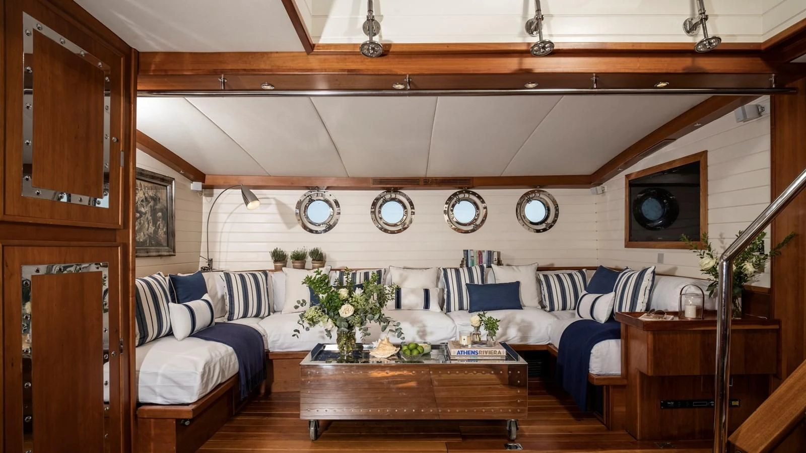 a living room with a couch and a coffee table aboard ALEXA OF LONDON Yacht for Sale