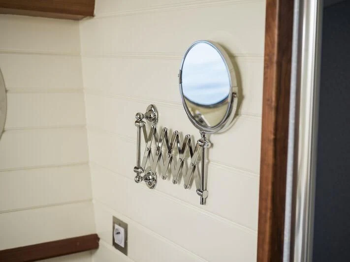 a mirror on a wall aboard ALEXA OF LONDON Yacht for Sale