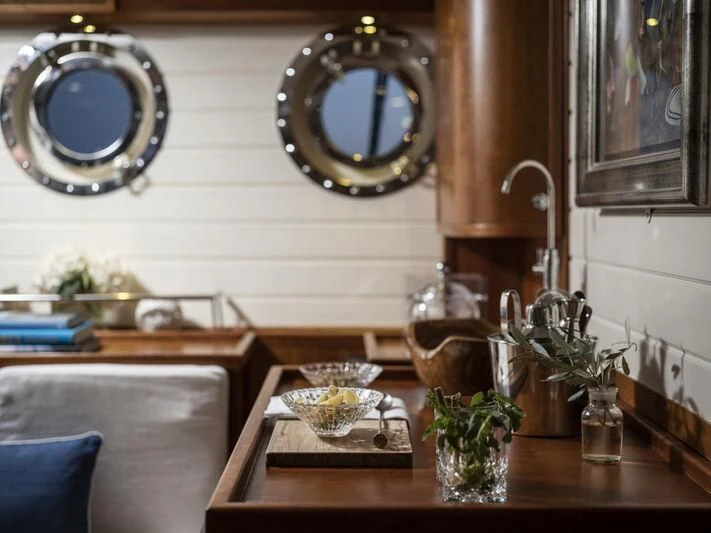 a clock on a wall aboard ALEXA OF LONDON Yacht for Sale