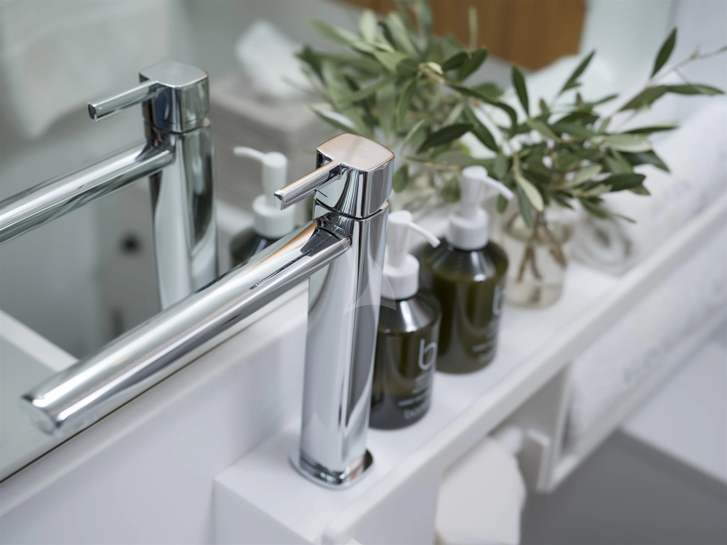 a sink with a faucet and a plant in a bathroom aboard ALEXA OF LONDON Yacht for Sale