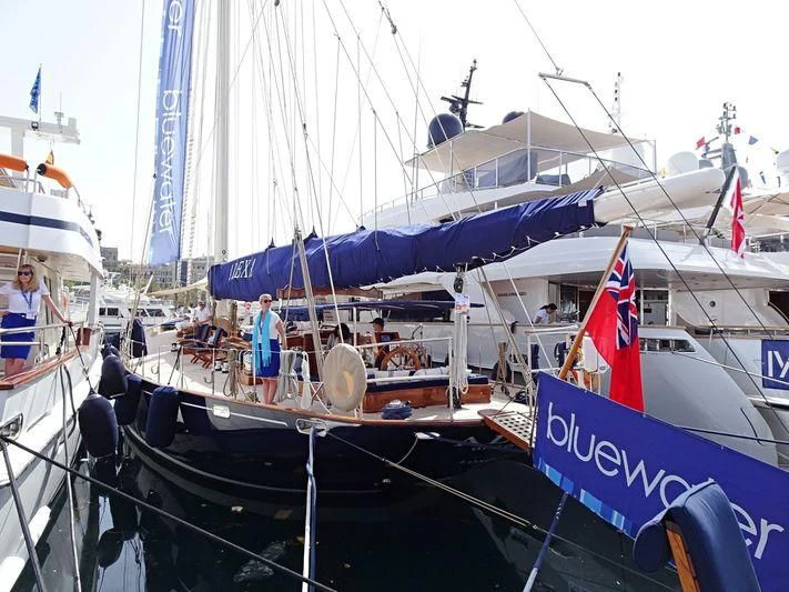 a boat with flags on it aboard ALEXA OF LONDON Yacht for Sale