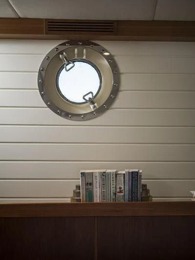 a clock on a wall aboard ALEXA OF LONDON Yacht for Sale