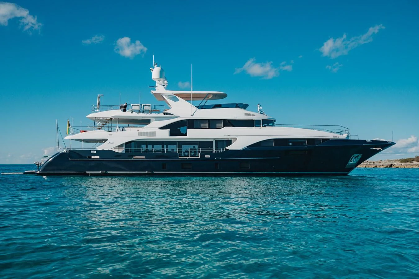a large boat in the water aboard COFINA Yacht for Sale
