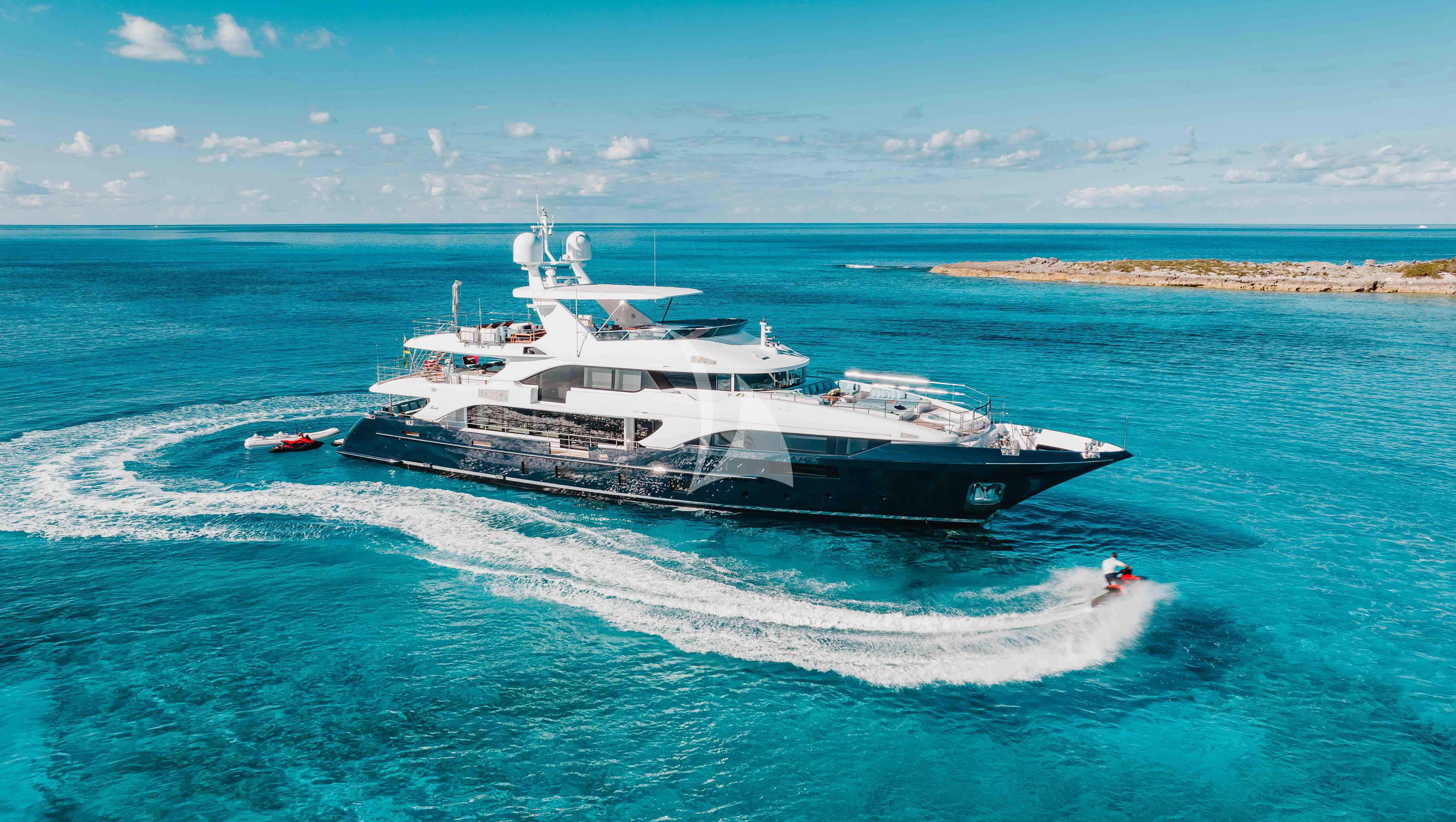 a large white ship in the ocean aboard COFINA Yacht for Sale