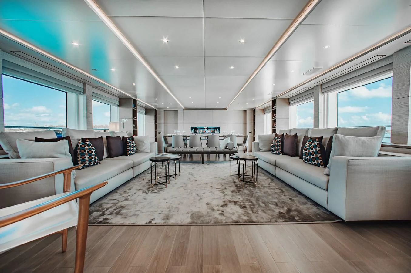 a room with a bed and a couch aboard COFINA Yacht for Sale