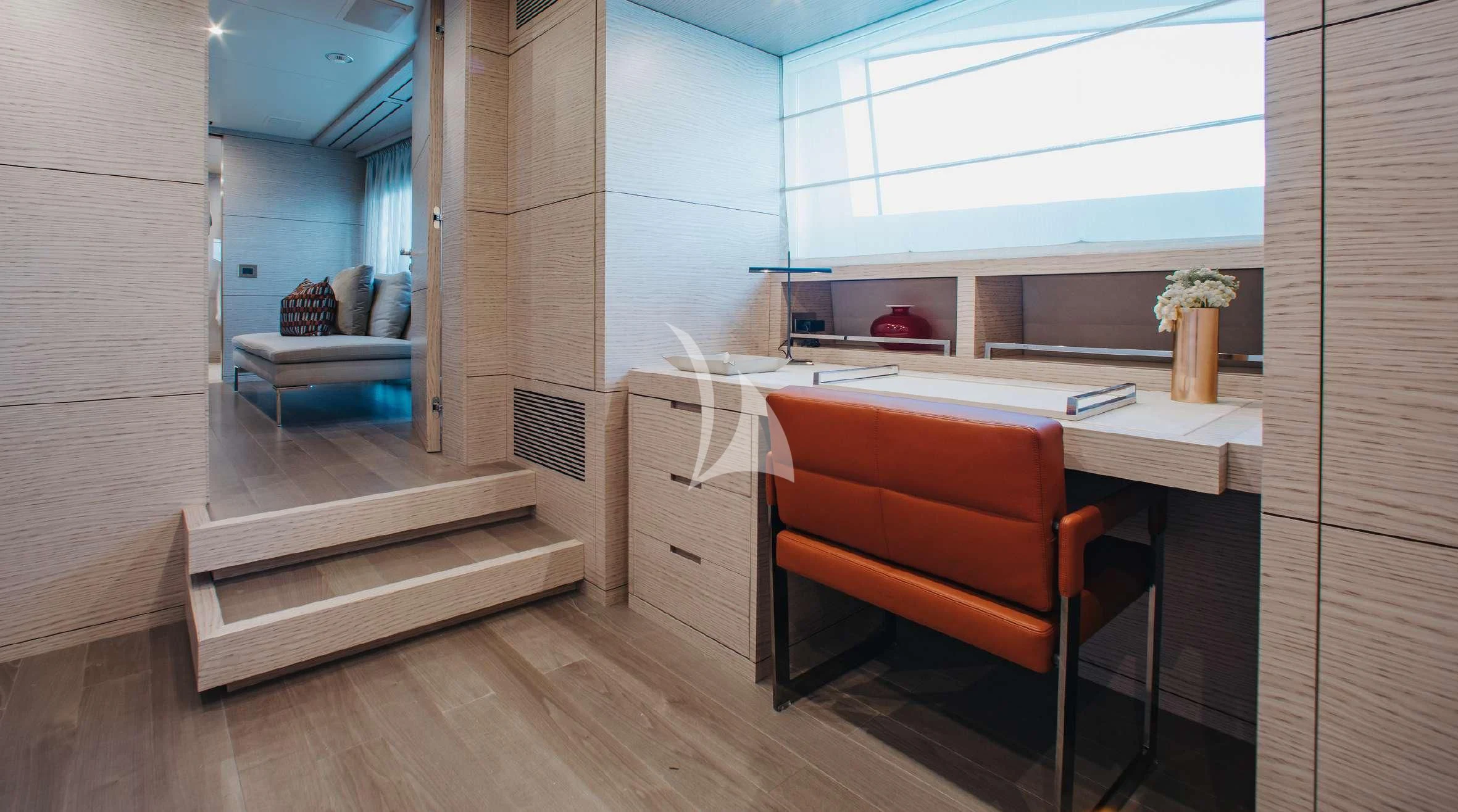 a room with a desk and a chair aboard COFINA Yacht for Sale