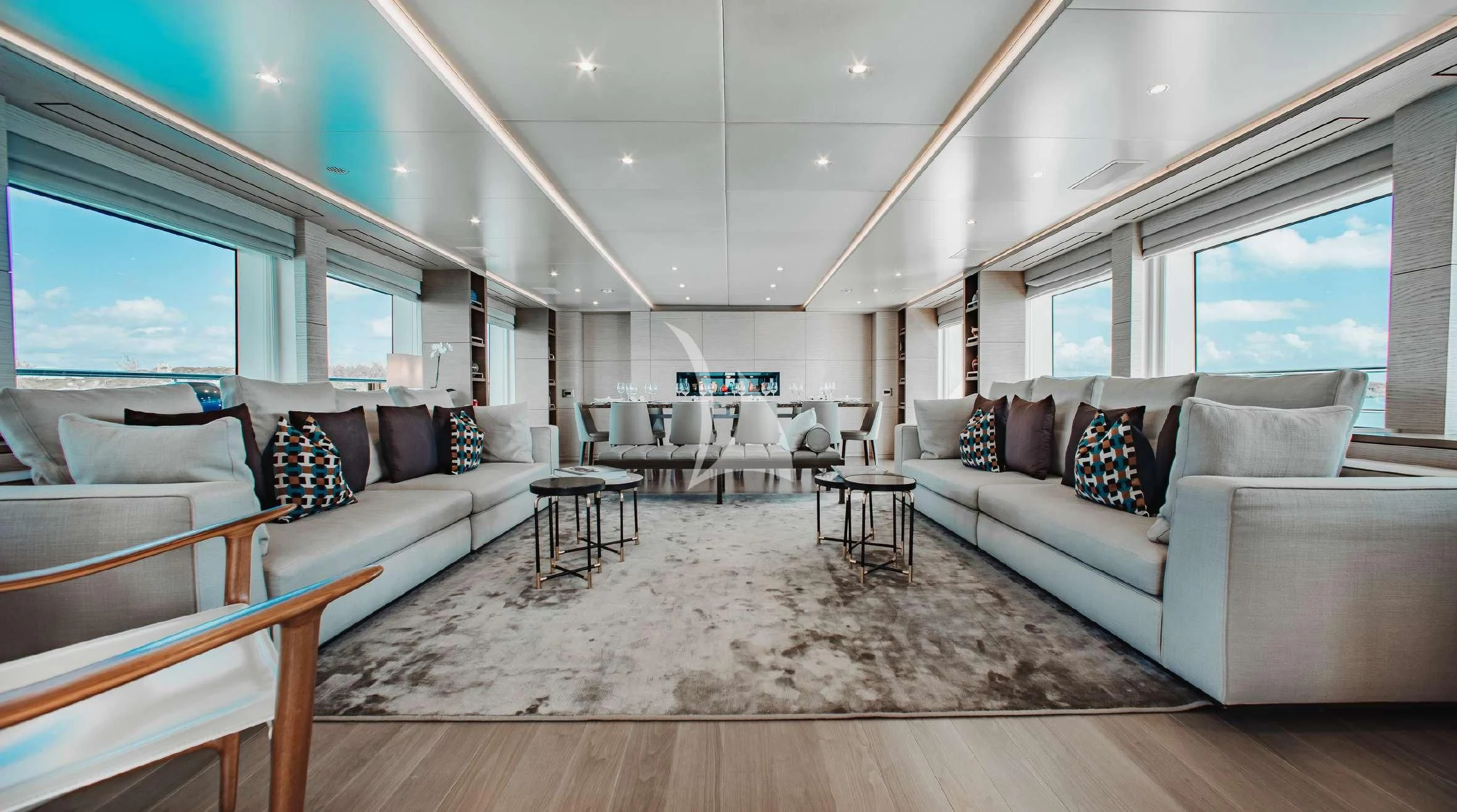 a large living room with a large bed and a large window aboard COFINA Yacht for Sale