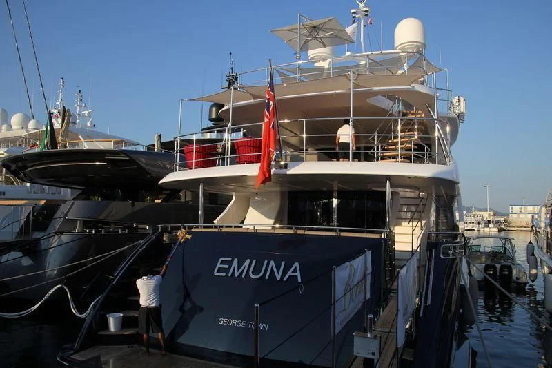 a large ship docked aboard COFINA Yacht for Sale