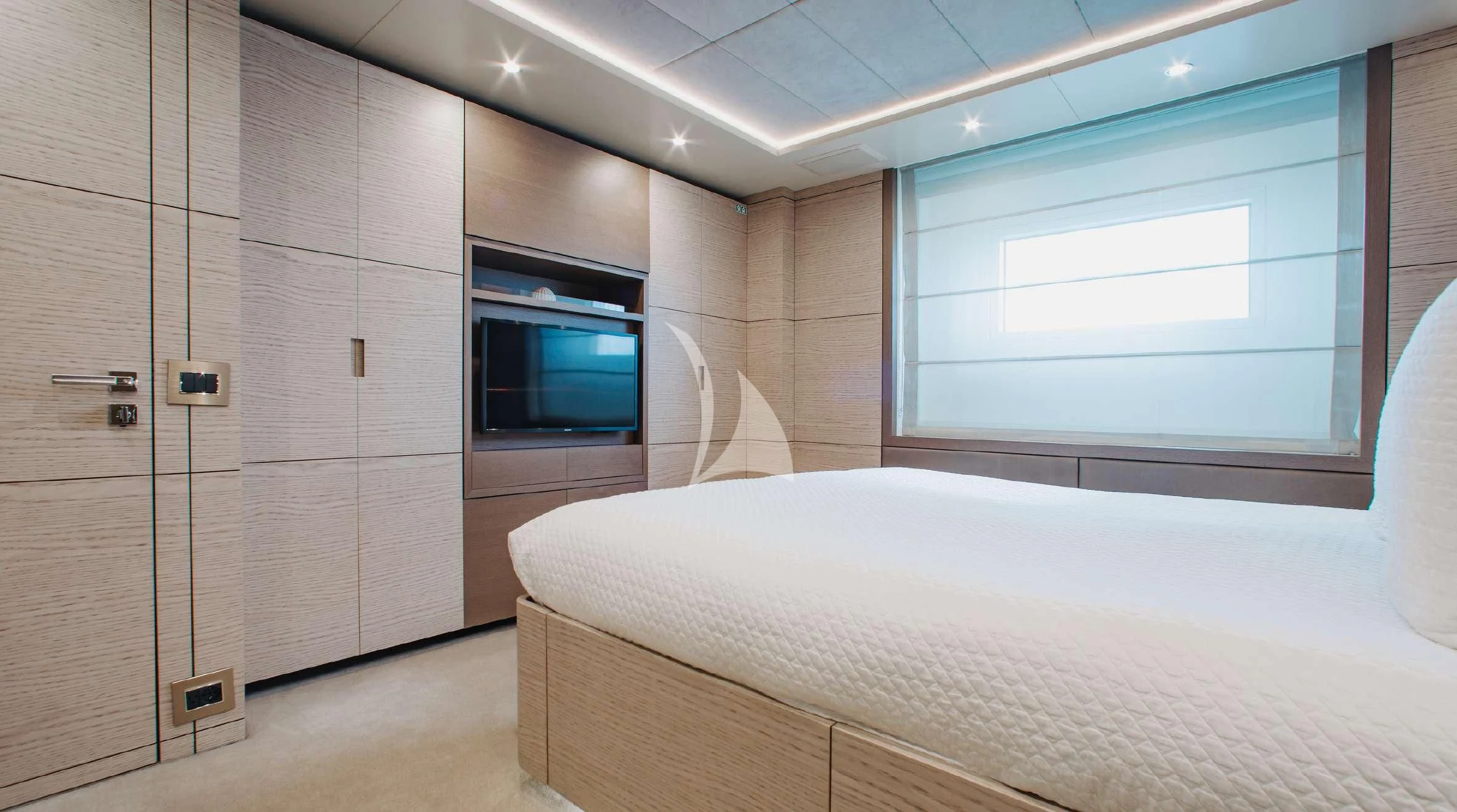 a bed in a room aboard COFINA Yacht for Sale