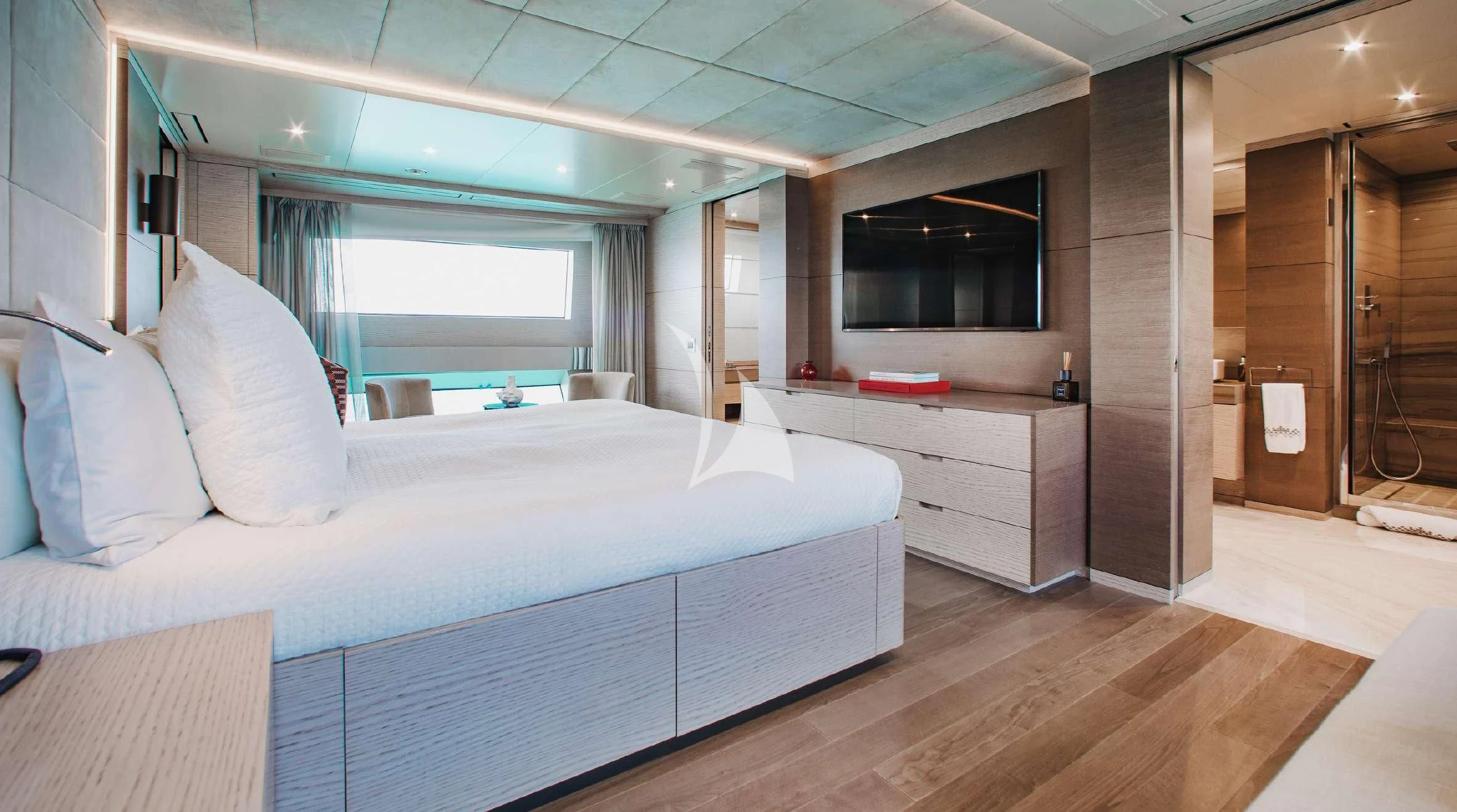 a large bedroom with a bed aboard COFINA Yacht for Sale